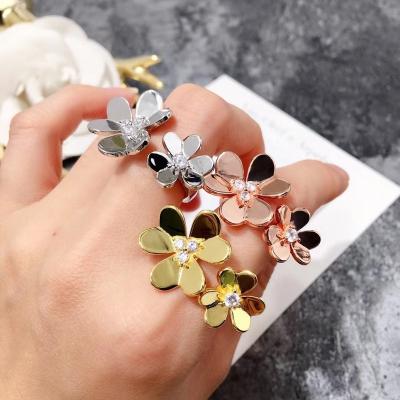 China Romantic High quality fashion lucky clover open ring luxury plated 18K double clover women's ring jewelry wholesale for sale