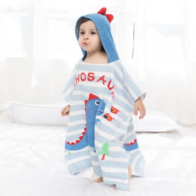 China Custom Compressed Cotton Surf Poncho Cartoon Bathrobe Towels Bath Hooded Beach Towel For Kids for sale