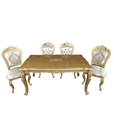 China EUROPEAN Popular Solid Wood Gold 1+6 Chair Dining Table Set European Contemporary Dining Set for sale