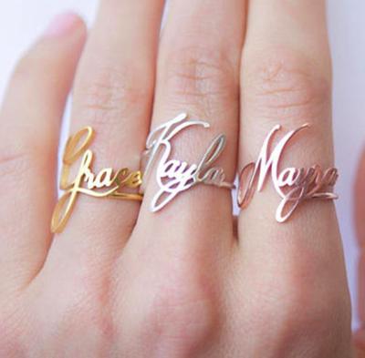 China FASHIONABLE Name Initial Letter 18k Gold Plated Ring For Couple Stainless Steel Custom Adjustable Rings Wholesale for sale