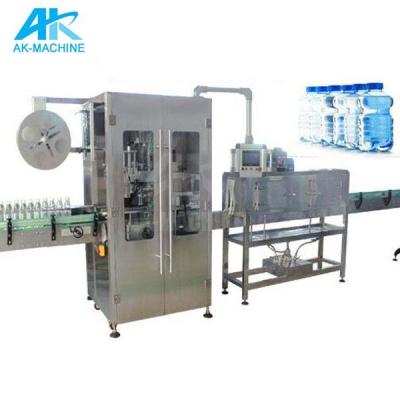 China labeling machine/beverage sleeve shrinking label sleeve machine/automatic sleeving labeling machine for sale