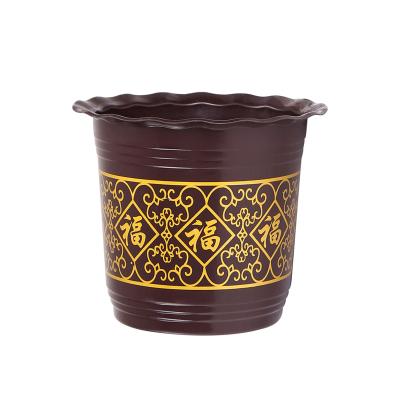 China 2022 painted flower pots large black plastic round pot spikes wholesale for home for sale