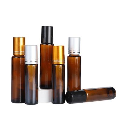 China Cosmetic Customize Amber Refillable Classical Glass 10ml 15ml Roll On Bottles With Foil Cap For Essential Oil Perfume for sale