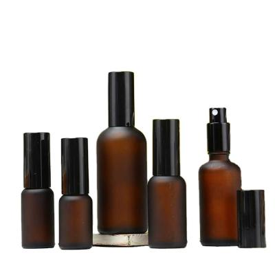 China 5 10 Cosmetic 15ml 20ml 30ml 50ml 100ml Frosted Amber Spray Essential Oil Black Spray Pump Cap Refillable Amber Glass Spray Bottle With for sale