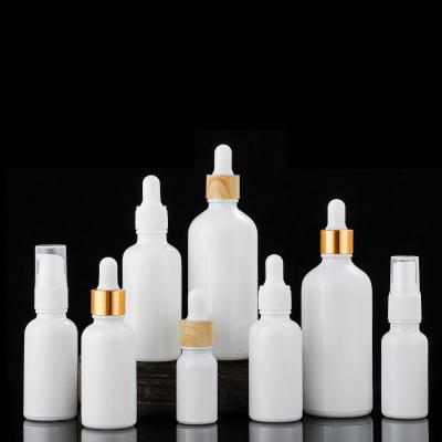 China Wholesale 10ml 20ml 30ml 50ml 60ml 100ml White Frosted Glass Cosmetic Pearl Dropper Bottle for sale