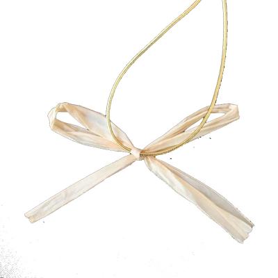 China Bowknot Pre-tied natural raffia bow with elastic loop/high quality natural raffia ribbon bow/hot sale elastic pot raffia bow,gift B for sale