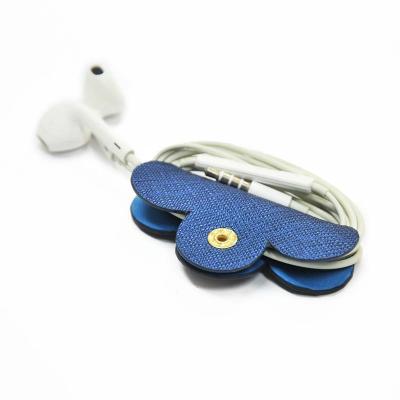 China Personalized Leather Earbuds Organizer Holder Cord Cable Grain Texture Leather Earphone Wrap Full for sale