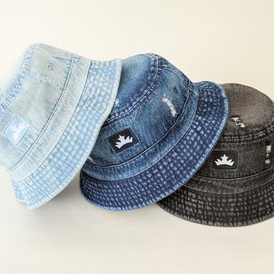 China 2022 Summer Wholesale Sun Protection Embroidered Logo Ripped Bucket Hat Washed Denim Patch Bucket Designer Bucket Hats for sale