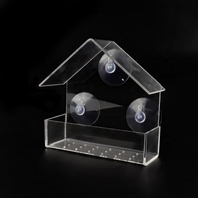 China Sustainable House Shape Clear Plastic Bird Feeder With 3 Strong Suction Cups for sale