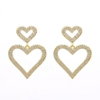 China Latest Design Romantic Brass Earring Women's Heart Gold Tasty Statement Stud Earrings For Girls for sale