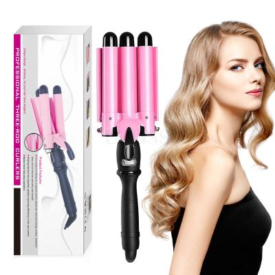 China 3 Barrel Curling Iron Wand Pink Heat Adjustable Settings TikTok 25MM Three Barrel Wave Curling Iron for sale