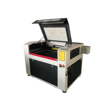 China The laser marking laser engraving machine is used to spray metal materials to engrave 6090 1390 engravings and laser cutting machine for sale