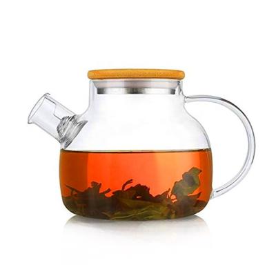 China Sustainable Clear Glass Teapot With Bamboo Lid With Removable Infuser For Stovetop Safe for sale