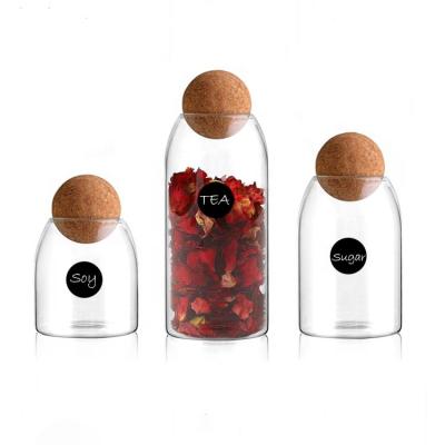 China Unique Microwavable Clear Glass Storage Jar with Airtight Seal Cork Wood Lid Ball for sale