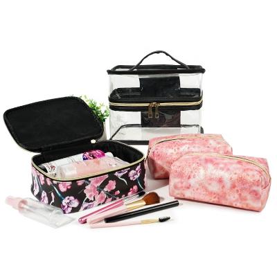 China Double Layer Large Capacity 4pcs PVC Train Case Durable Clear Flower Glitter PU Printing Cosmetic Storage Travel Bag Set for sale