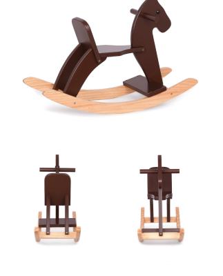 China Ride On Toy Swing Horse Solid Wood Jumping Toy For Kids for sale