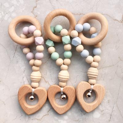 China Wholesale Nature Safe Baby Wooden Gym Toy Rattle Teething Stuff Eco-Friendly With Dummy Bell Holder Nipple Clip Montessori Inspired Toys for sale