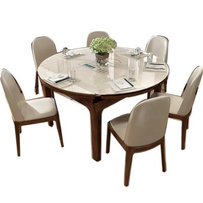 China Good quality modern style solid wood rectangle/cricular round telescopic dining table with glass table top dining room furniture wholesale for sale