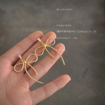 China Temperament FASHIONABLE Korean Creative Design Earrings Bow Needle Silver Jewelry Fashion Atmospheric Fashion for sale