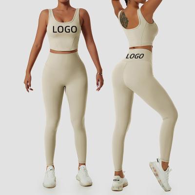 China Sweat-Wicking Recycled Fabric Nylon Women Sportswear Gym Fitness Running Two Piece Bra Yoga Suit for sale