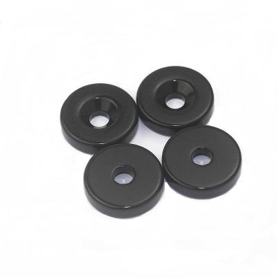 China Industrial Neodymium Disc Magnet Super Strong Disc Magnet Black Epoxy Magnet With Hole for sale