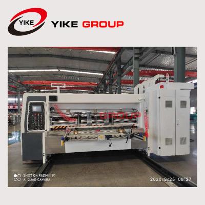 China Máquina automática de Slotter de la impresora de Flexo del color del alimentador cuatro del borde de ataque para las cajas regulares del cartón en venta