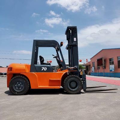 China 7000 kg FD70 7 Tonnen Diesel-Forklift mit dreifachem Mast und Gabelpositionierer zu verkaufen