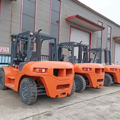 China Oranje counter balance vorkheftrucks 4m mast Diesel vorktruck 5000 kg Te koop