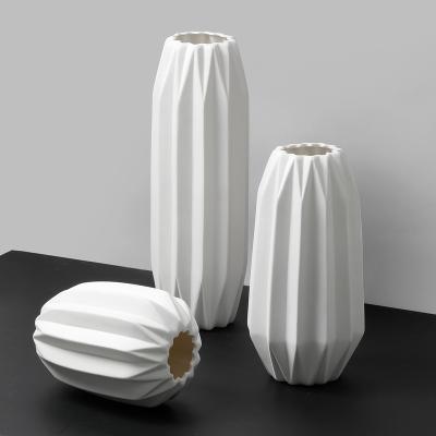 China Ware Ceramic Vases Wholesale Nordic Geometric Ceramic Vases for Home Decor Porcelain White Ceramic Origami Tabletop Flower Vases for Home Decor for sale