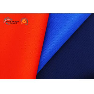 China 100% Recycled Yarn Eco-Friendly Polyester GRS Certificate RPET Breathable Eco Friendly 600D Polyester Bottles Pet Fabric For Bags for sale