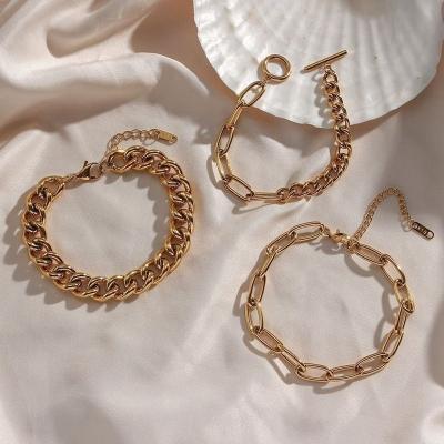 China New FASHIONABLE gold splicing Cuba with mill round oval chain buckle stainless steel antique chain bracelet for sale