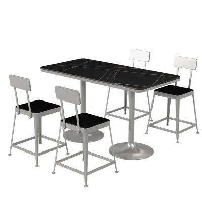 China Simple foldable modern restaurant metal table and chair set snack restaurant chipped stone table and chair set for sale