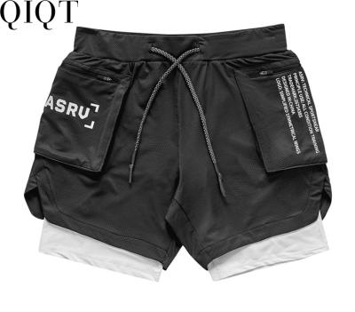 China New Summer Sports Mesh Drawcord Quick Drying Double Layer QUICK DRY Camouflage Mens Summer Shorts Gym Training for sale