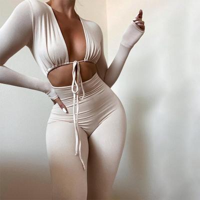 China 2022 New Solid Color V Spring Lady One Piece Jumpsuit Women Bodysuits Sexy Open Bandage Deep QUICK DRY Navel Long Sleeve Women Bodysuits for sale