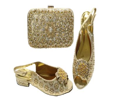 China 2021 New Arrival Gold Women Disposable Shoes And Matching Clutch Bag African Wedding Shoes For Women High Heels Party Pumps for sale