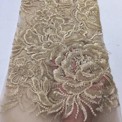 China Viable New Arrival French Net Tulle Lace With Sequins For 2019 Wedding Dress Lace Fabrics With Embroidered And Beads for sale