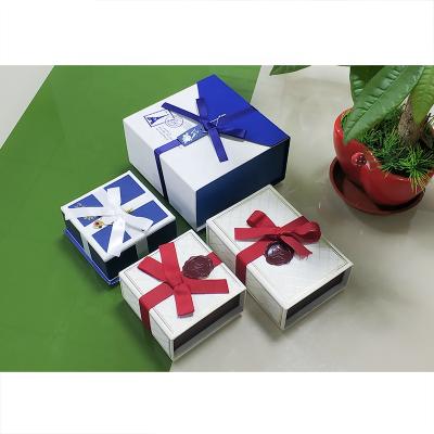 China Handmade Popular Small Rigid Soft Chocolate Candy Gift Box Packaging With Silk Ribbon for sale