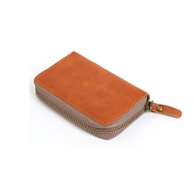 China High quality handmade cowhide leather organ case vegetable tanned vintage high capacity leather card case for sale