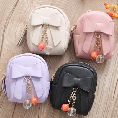 China Fashion Small Bag Charm Cute Bow Decor Kids Mini Backpack Pouch Keychain Zip Coin Purse for sale