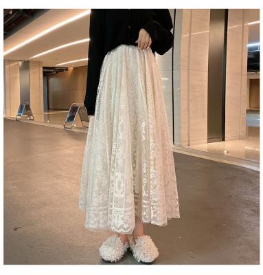 China Breathable long skirt female lace hollow out French romantic middle swing skirt high waist skirts length a-line for sale