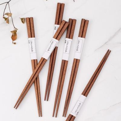 China Sustainable Custom logo eco-friendly cutlery iron wood chopsticks chop sticks japanese wooden sushi chopsticks set palillos chinos for sale