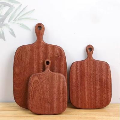 China Sustainable wholesale kitchen thick large bulk blank round personalized custom koa black walnut acacia wood bamboo cutting board with handle for sale