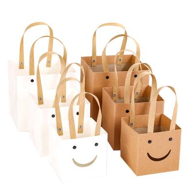 China Recycled Materials White And Twisted Brown Kraft Paper Handle Shopping Carrier Bag With Logo Printed for sale