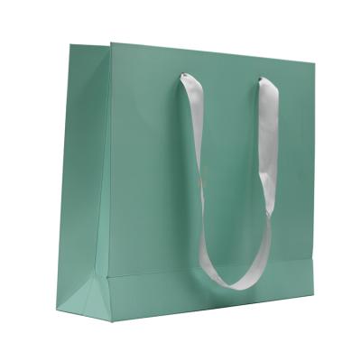 China Recyclable Custom Logo Print Luxury Packaging Shopping Gift Paper Bag for sale