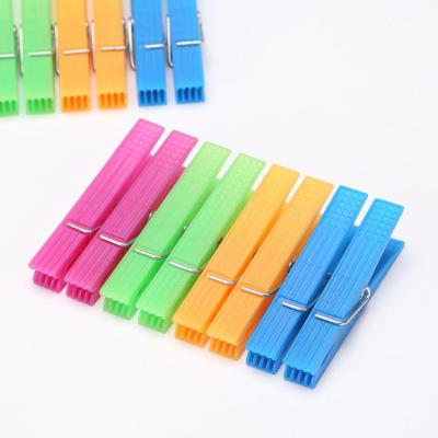 China Traditional Colorful Plastic Spring Clothespin Small Laundry Drying Clip Clothes Hanging Pegs Clothespins for sale