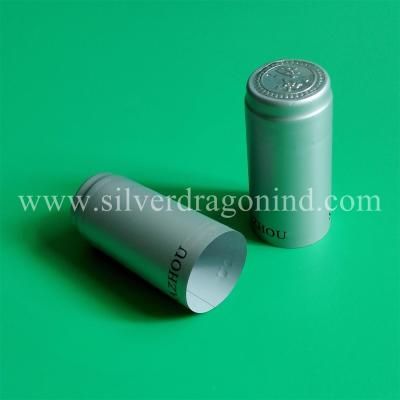 China Silver color PVC shrink capsules for walnut oil sealing, top disc embossed, size customized for sale