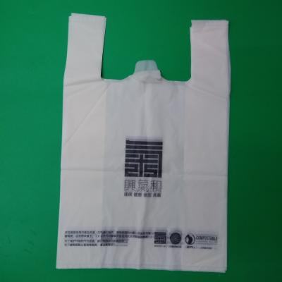 China 100% biodegradable and compostable T-shirt bag, 1 color 2 sides printed, size 0.04mm x (30+16)x46cm, withstand 5kg for sale