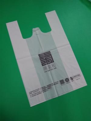 China 100% biodegradable starch T-shirt bag, 1 color 2 sides printed, size 0.04mm x (30+16)x46cm, withstand 5kg for sale