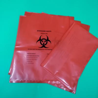 China Red biohazard disposable bag, size 300x360x0.12mm, print one color one side, for hospital use for sale