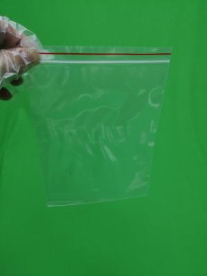 China Transparent plastic ziplock bag with red line, size 140x200x0.055mm for sale